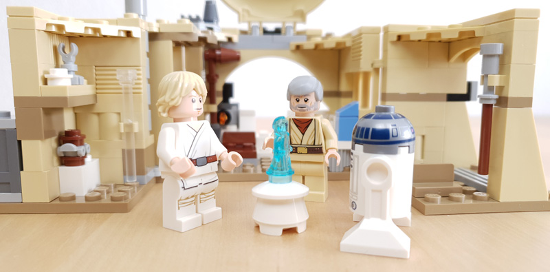 Luke, Obi-Wan und R2D2 spielen die Holonachricht ab
