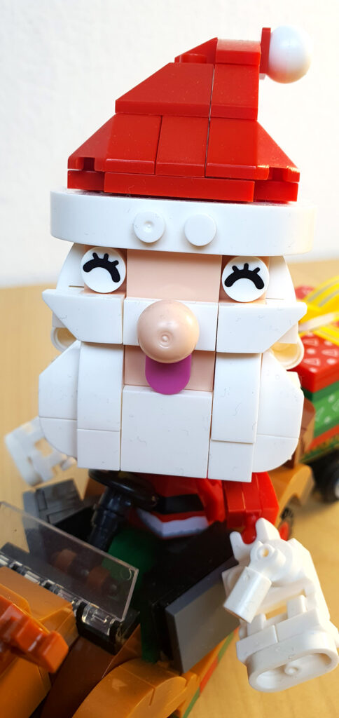 Xingbao Weihnachtsmann mit Rentierauto XB-18022 Set aufgebaut Detail Gesicht